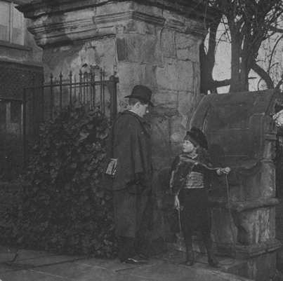 John Atkinson Grimshaw with his daughter Elaine outside front gateway of Knostrop Hall.